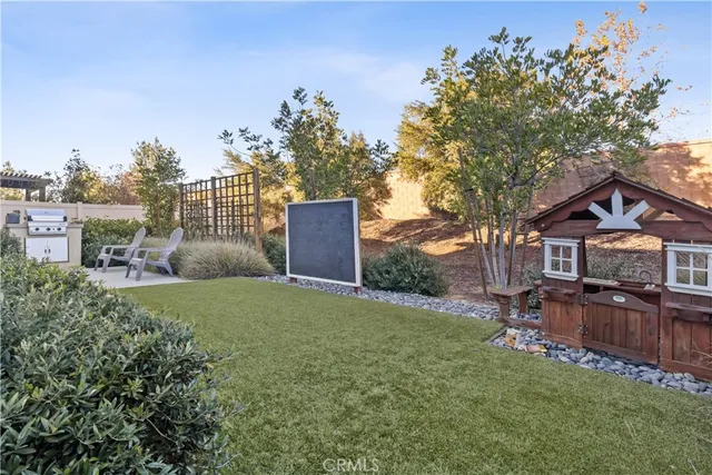 a house view with a garden space