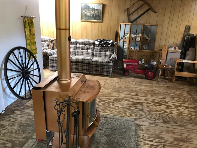 a view of a chairs and table in the patio