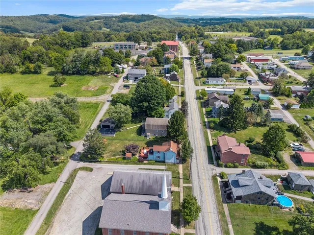 a picture of a bathroom with a shower