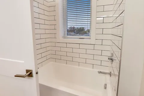 a bathroom with a bathtub