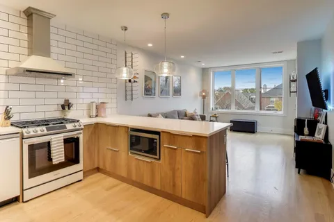 a kitchen with a stove and a microwave