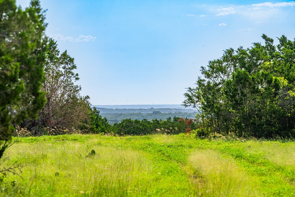 230 Camino Real Road Northwest Junction, TX 76849 - Photo 12 of 26 a view of an outdoor space and a yard