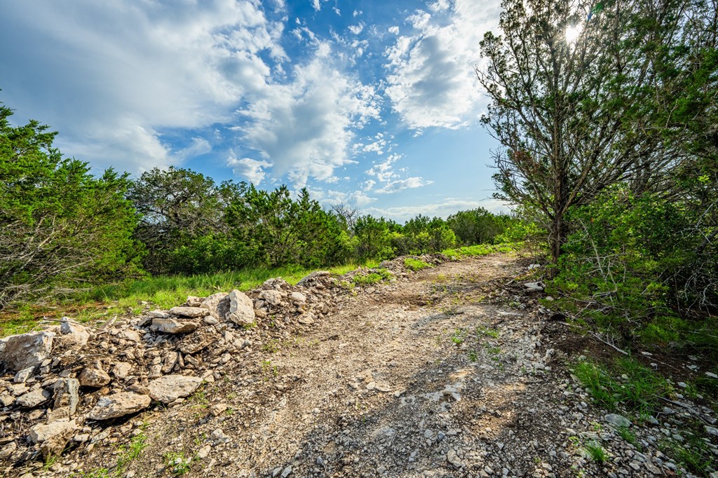 230 Camino Real Road Northwest Junction, TX 76849 - Photo 21 of 26 a view of an outdoor space with a lake view