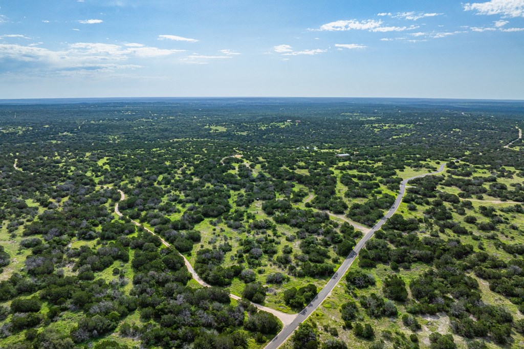 230 Camino Real Road Northwest Junction, TX 76849 - Photo 6 of 26 an aerial view of residential houses with city view