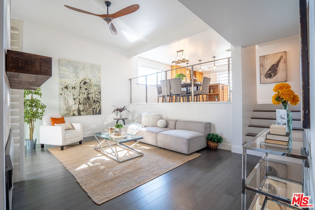 13214 Fiji Way, Unit T Marina del Rey, CA 90292 - Photo 1 of 31 a living room with furniture and wooden floor