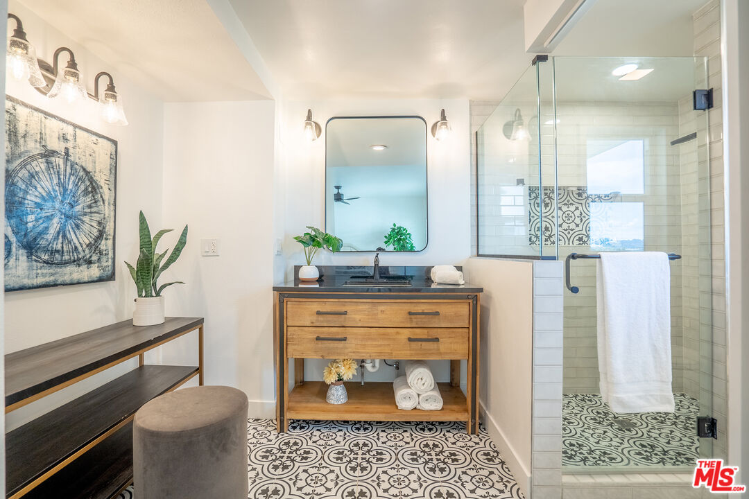 13214 Fiji Way, Unit T Marina del Rey, CA 90292 - Photo 18 of 31 a bathroom with a sink and a mirror