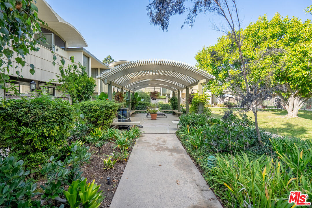 13214 Fiji Way, Unit T Marina del Rey, CA 90292 - Photo 28 of 31 a view of a pathway with a garden