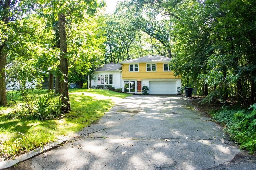 47 Craig Street Springfield, MA 01108 - Photo 1 of 18 a front view of a house with a yard