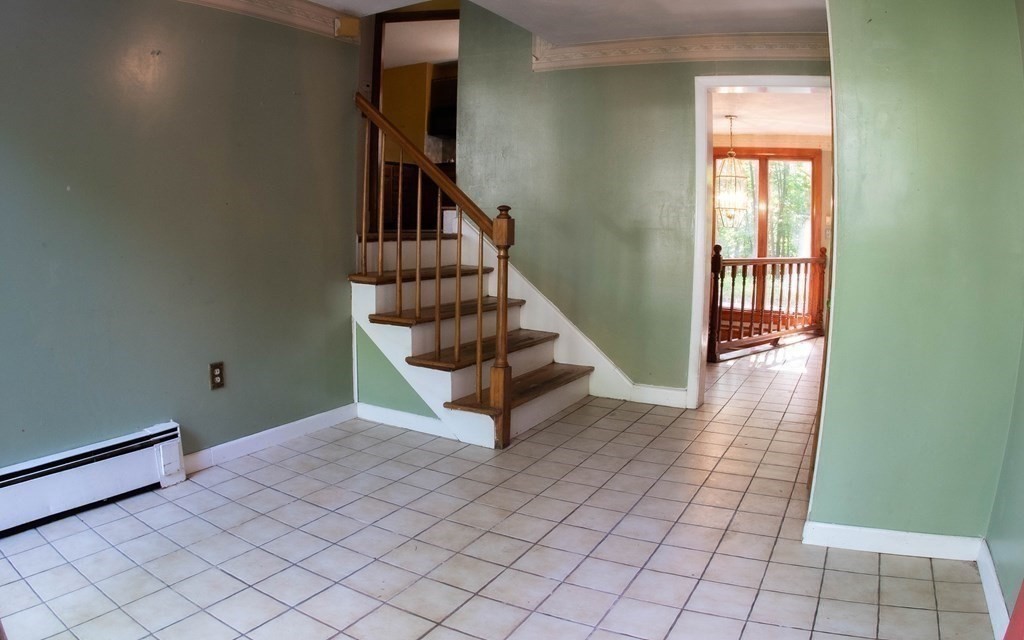 47 Craig Street Springfield, MA 01108 - Photo 2 of 18 a view of an entryway with staircase