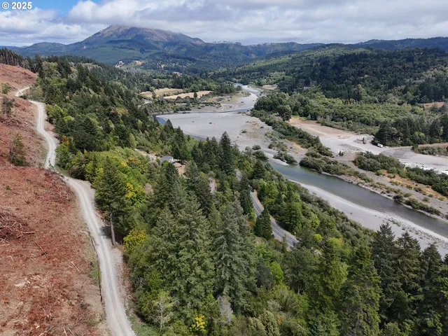 a view of a lake with mountains in the background