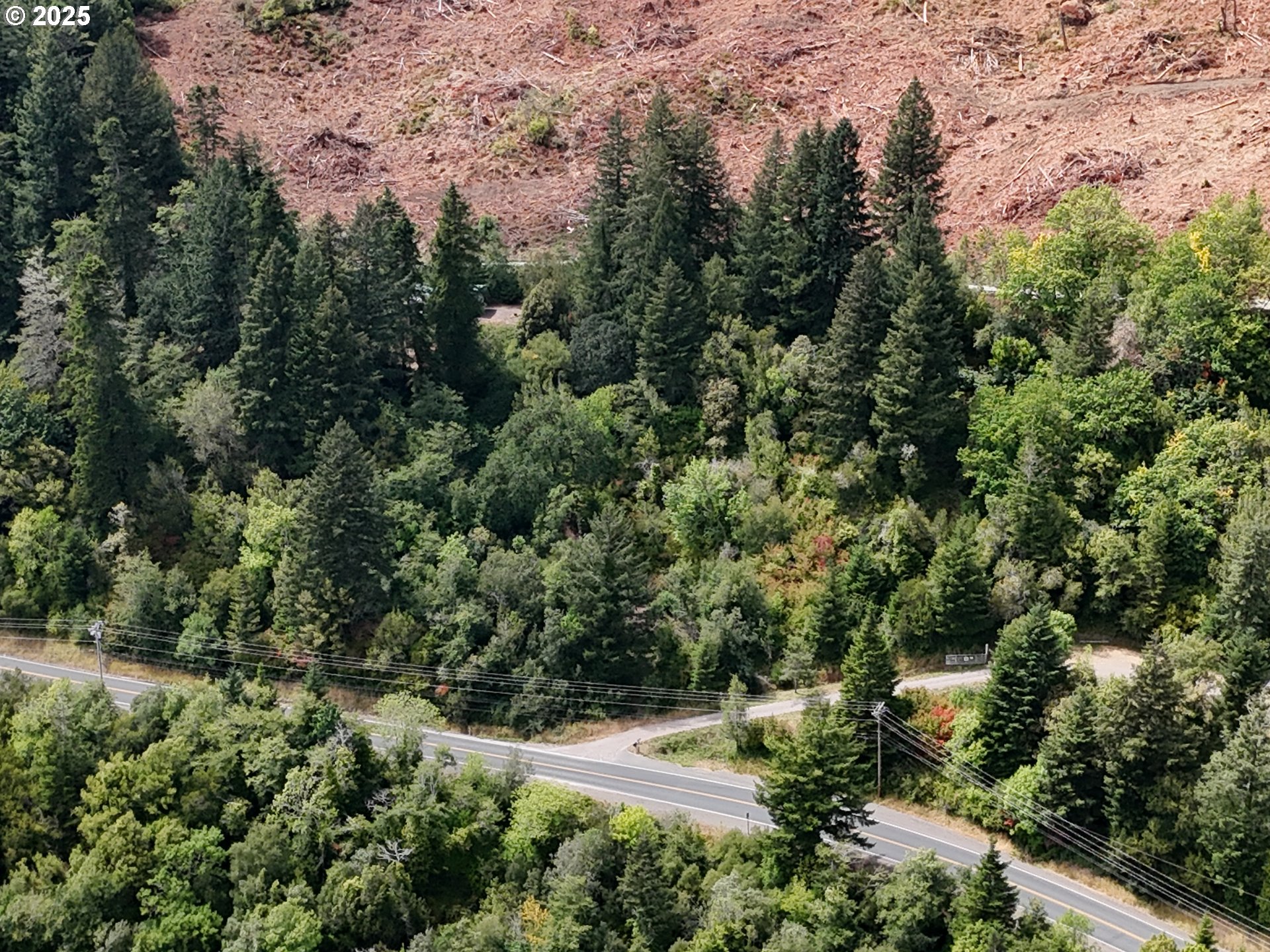 0 North Bank Chetco Brookings, OR 97415 - Photo 8 of 8 an aerial view of residential house with outdoor space and trees all around