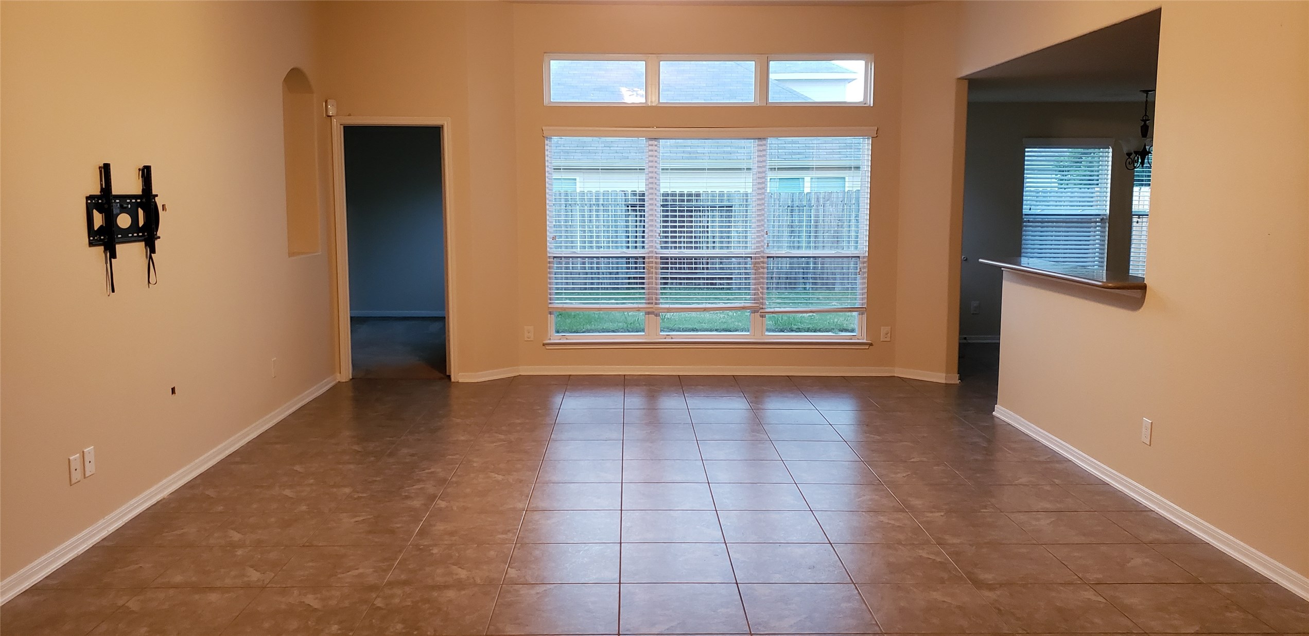 9923 Yearling Place Conroe, TX 77385 - Photo 14 of 36 a view of an empty room with a window