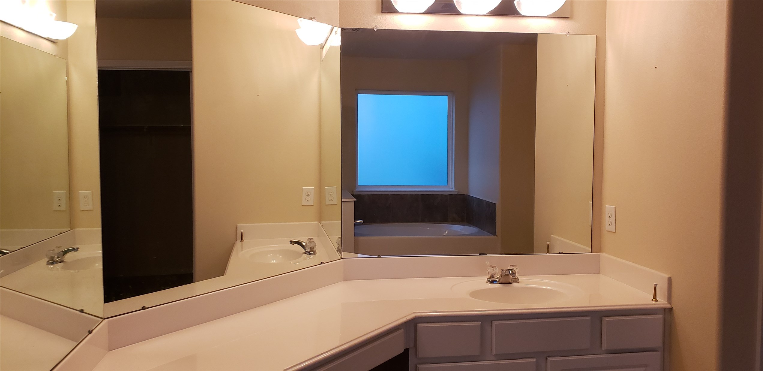 9923 Yearling Place Conroe, TX 77385 - Photo 16 of 36 a bathroom with a sink and a mirror