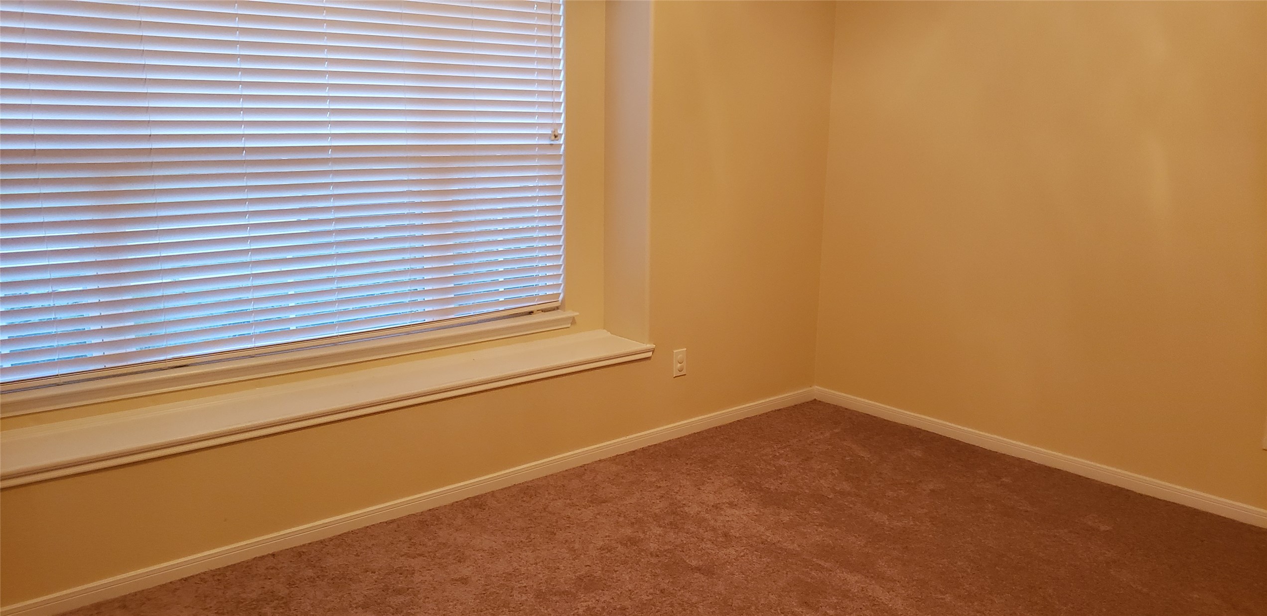 9923 Yearling Place Conroe, TX 77385 - Photo 24 of 36 a view of a small space with wooden floor and a window