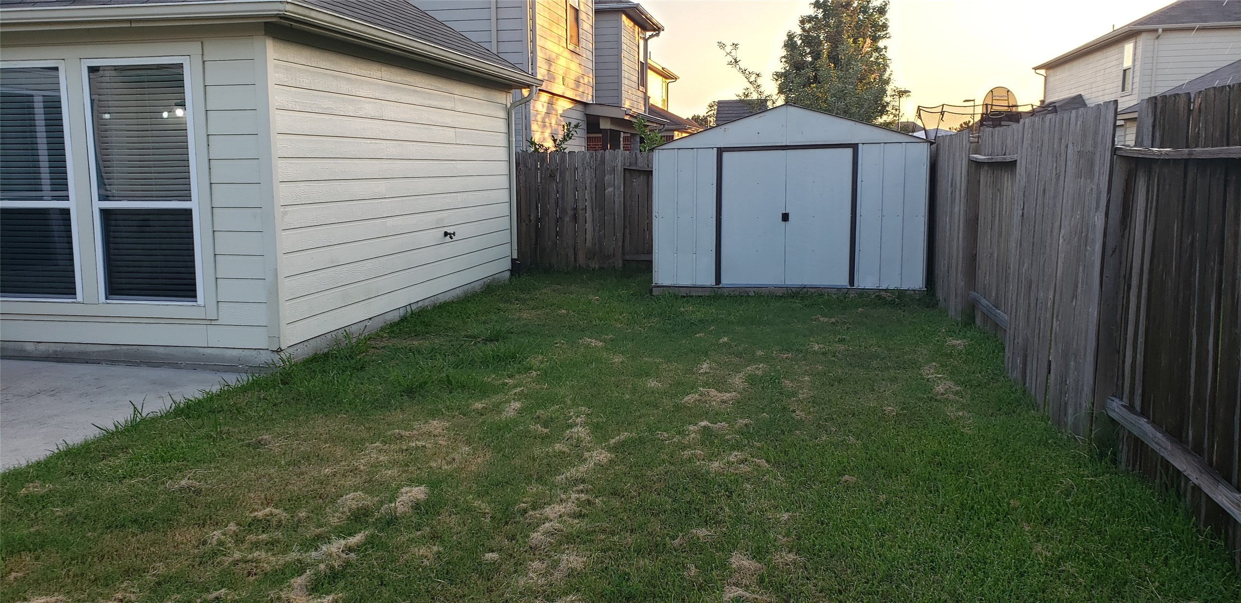 9923 Yearling Place Conroe, TX 77385 - Photo 35 of 36 a backyard of a house