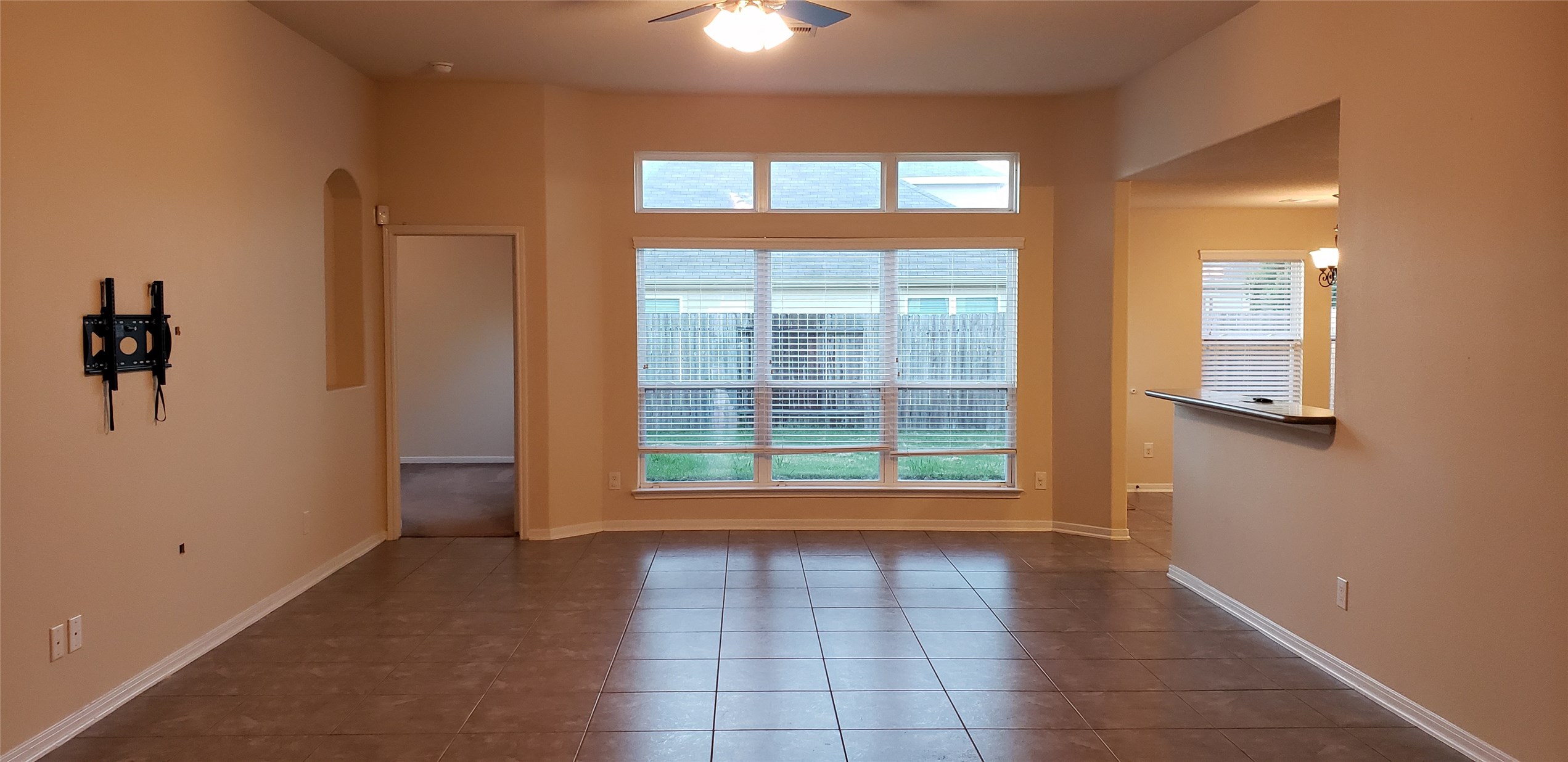 9923 Yearling Place Conroe, TX 77385 - Photo 7 of 36 a view of an empty room with a window