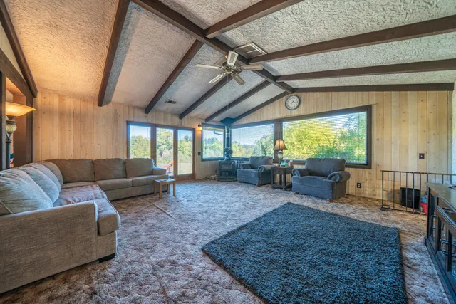 a bed room with a bed and a chandelier