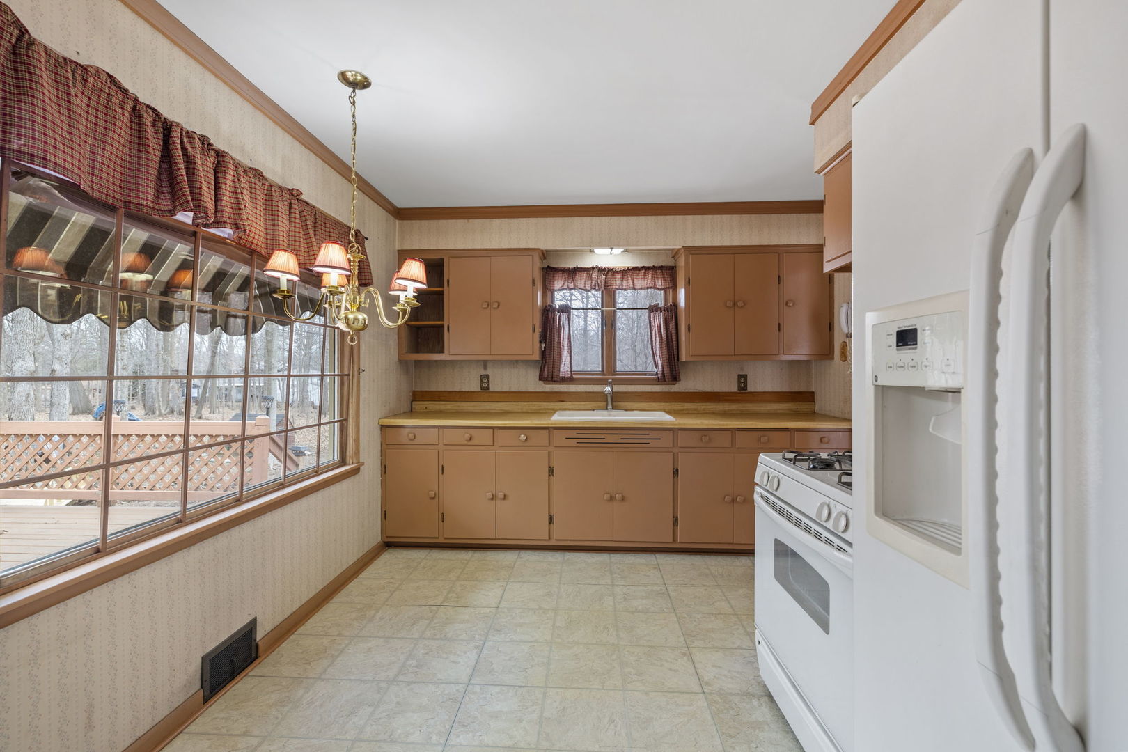 11040 Cleveland Road Mokena, IL 60448 - Photo 15 of 28 a kitchen with a cabinets and appliances