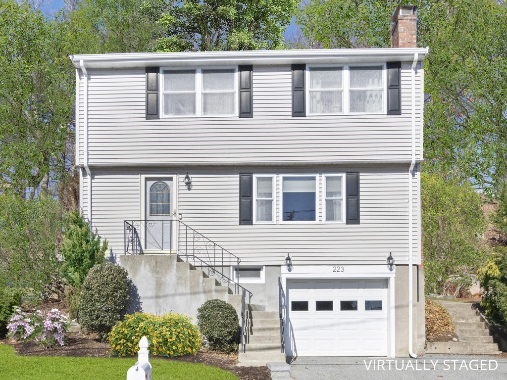 223 Hardy Pond Road Waltham, MA 02451 - Photo 1 of 38 a view of a house with a yard and sitting space