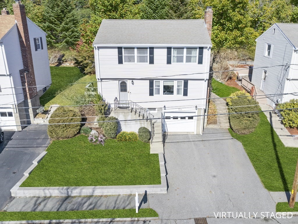 223 Hardy Pond Road Waltham, MA 02451 - Photo 2 of 38 a view of a house with a garden