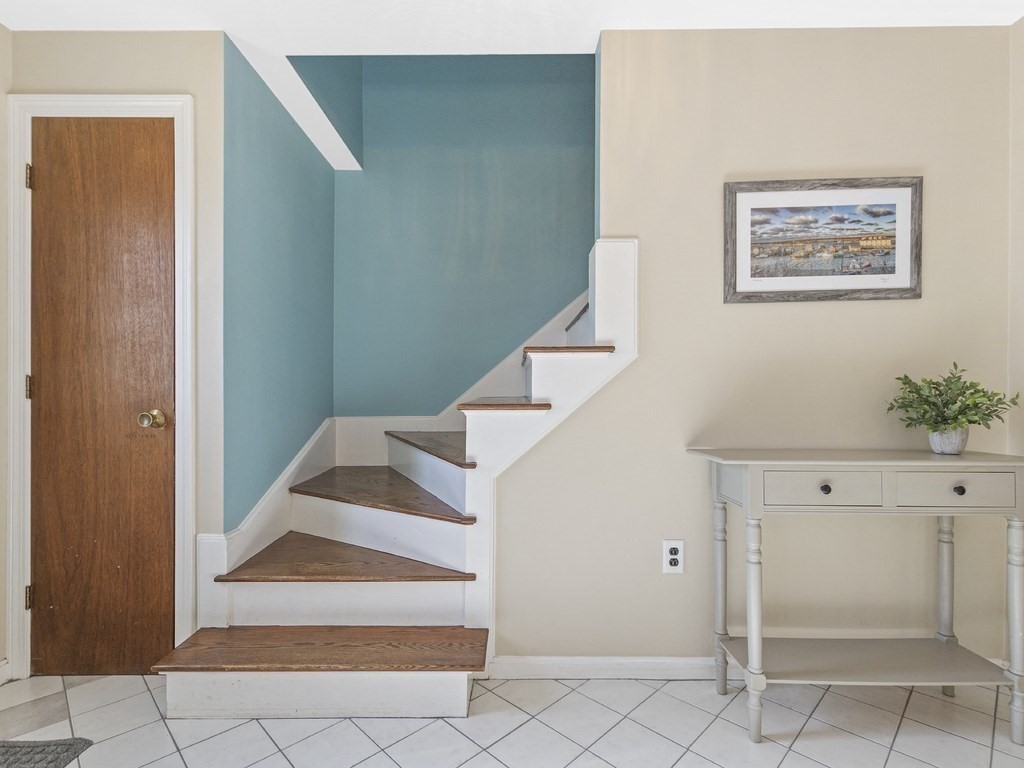 223 Hardy Pond Road Waltham, MA 02451 - Photo 21 of 38 a view of an entryway with staircase