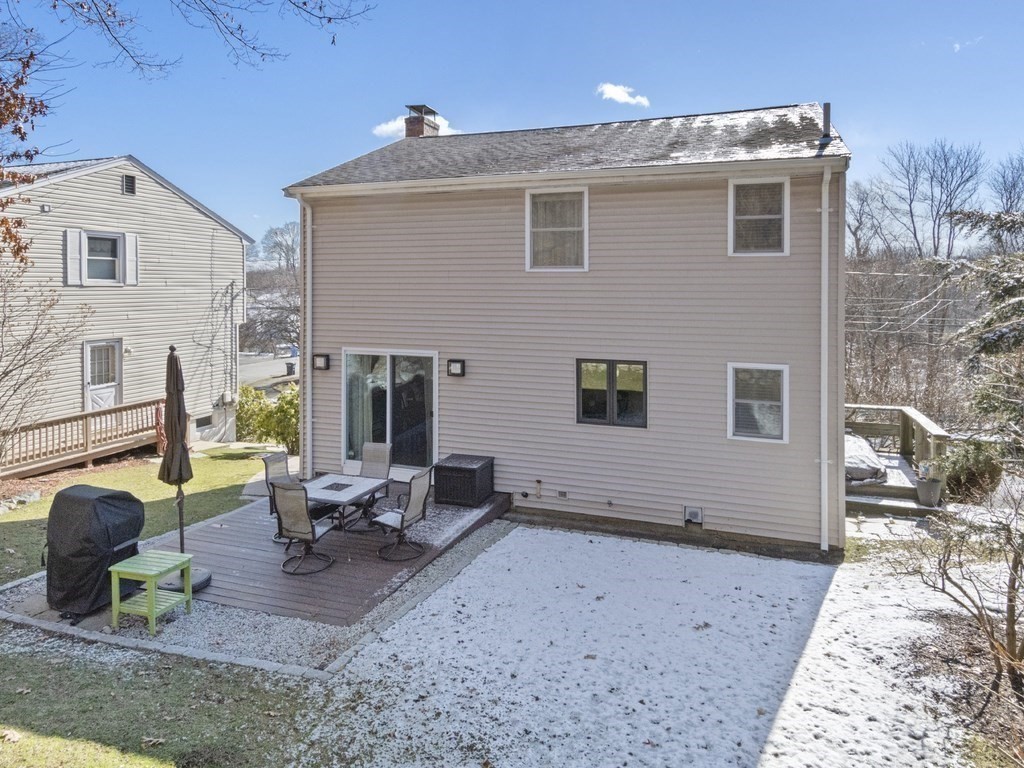 223 Hardy Pond Road Waltham, MA 02451 - Photo 34 of 38 a view of a house with a patio