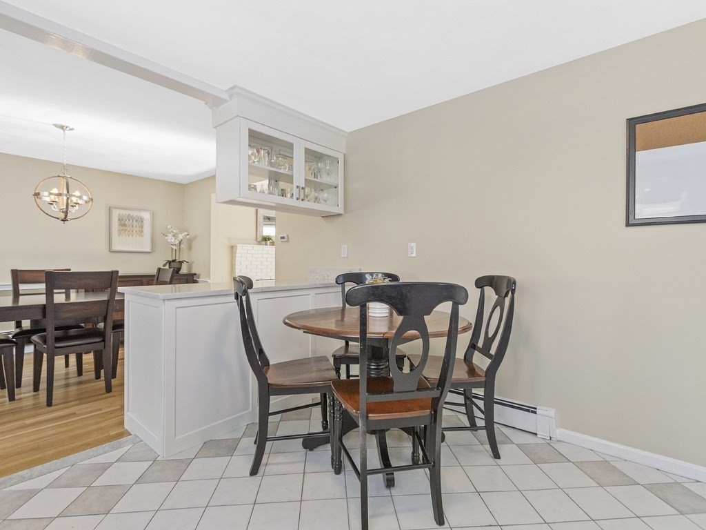 223 Hardy Pond Road Waltham, MA 02451 - Photo 7 of 38 a dining room with furniture and window
