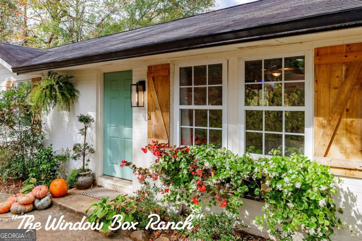 a front view of a house with a porch