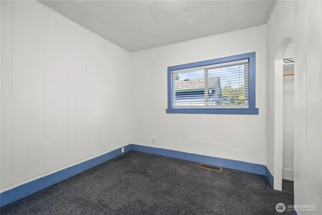 an empty room with closet