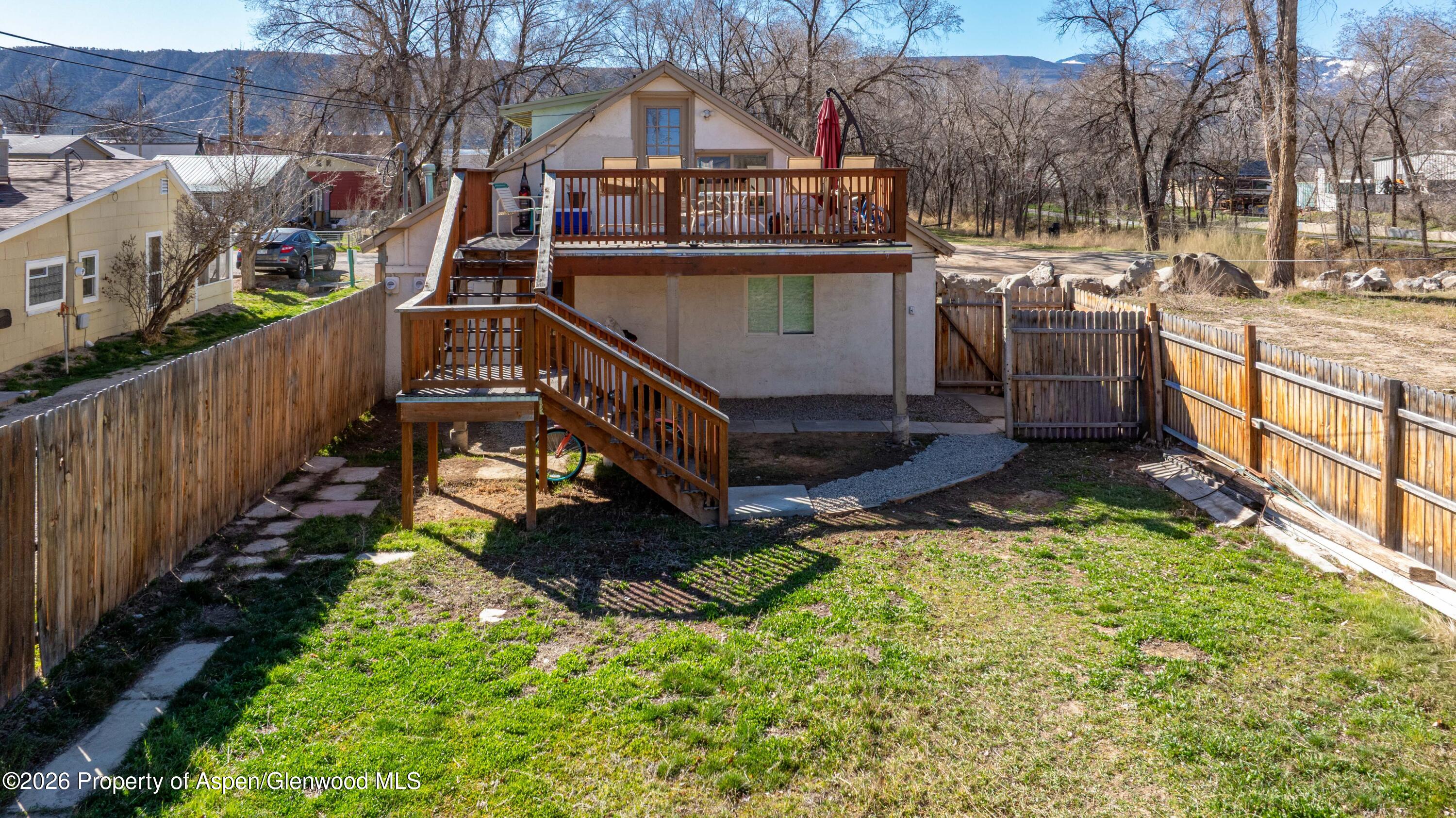 232 West 4th Street Rifle, CO 81650 - Photo 12 of 23 a view of a house with a yard