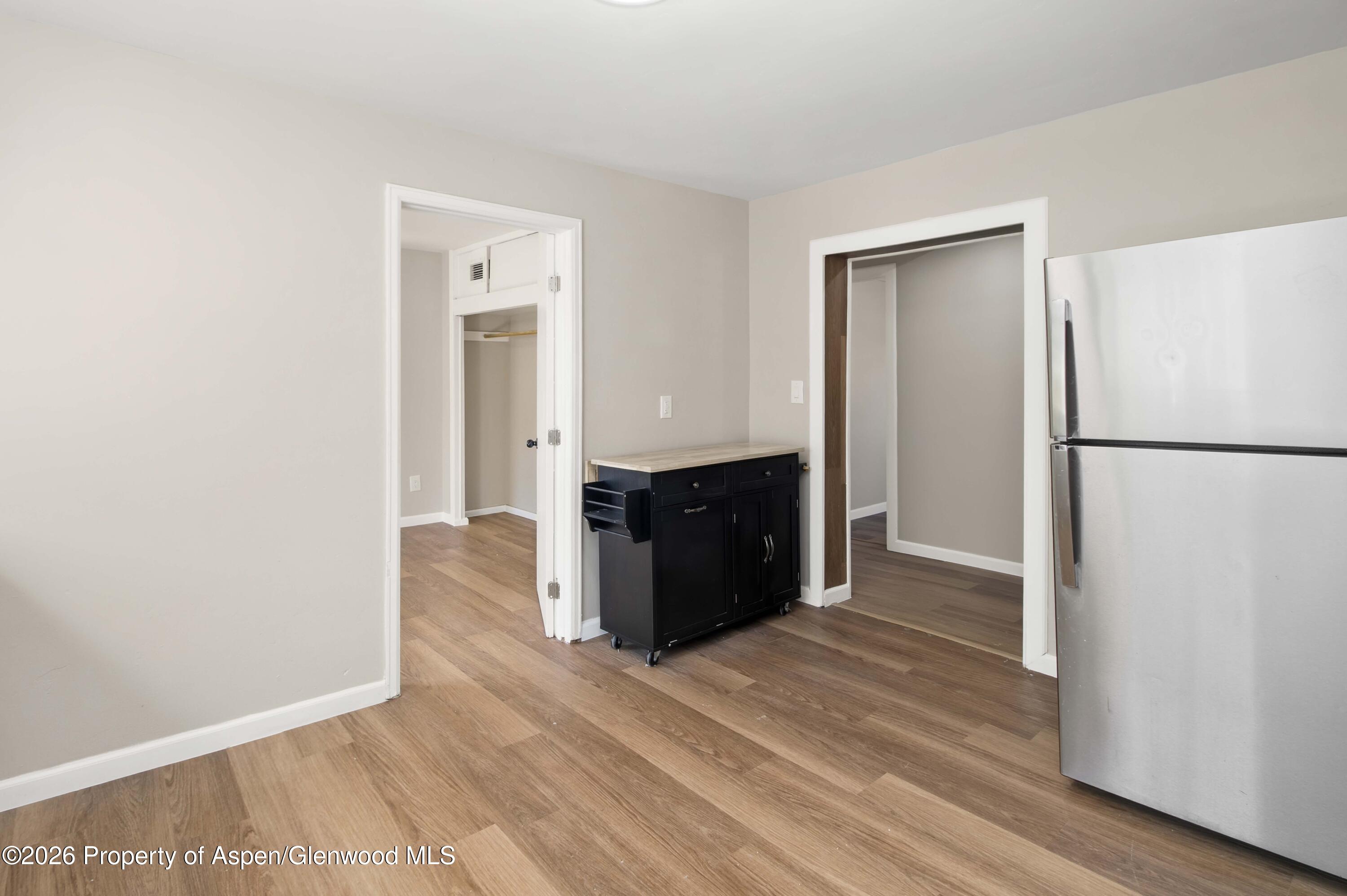 232 West 4th Street Rifle, CO 81650 - Photo 6 of 23 a kitchen with a refrigerator and a sink