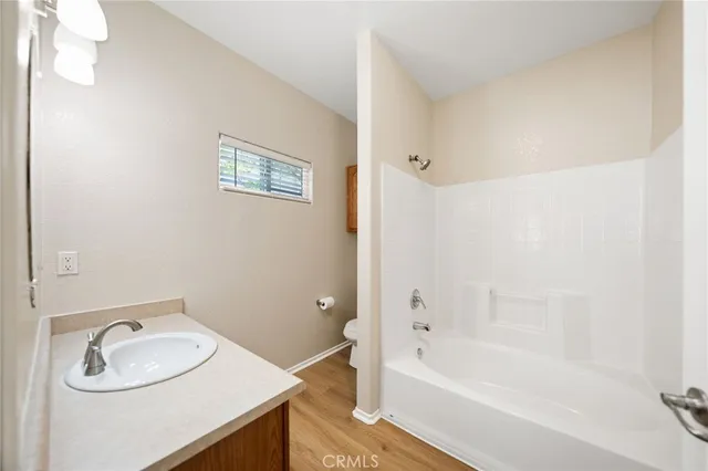 a bathroom with a sink and a bathtub