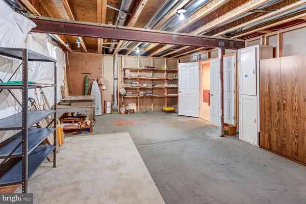 a view of a room with wooden walls