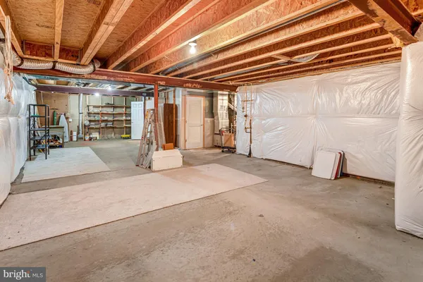 a view of gym equipment and windows