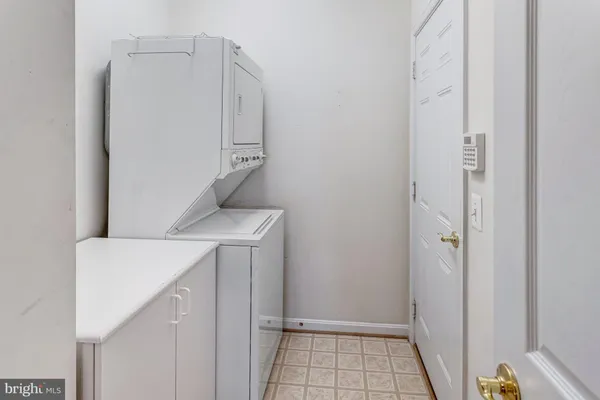 a view of a balcony with wooden floor