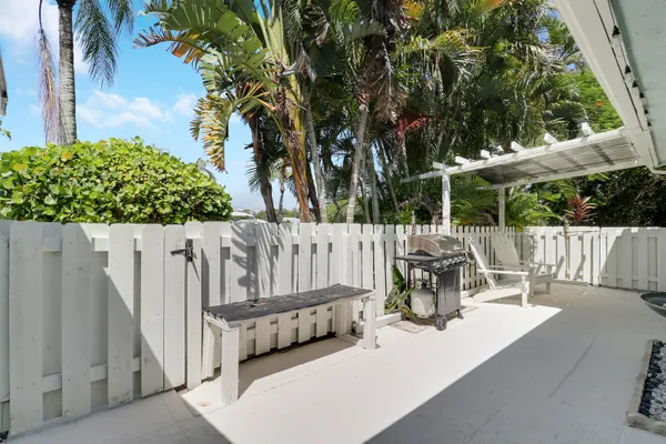 a view of balcony with furniture