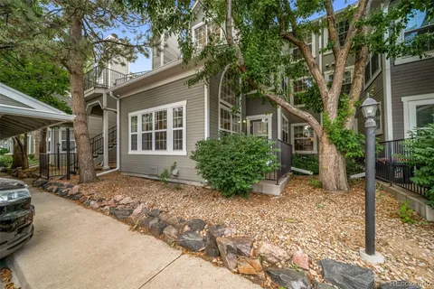 a house with trees in front of it
