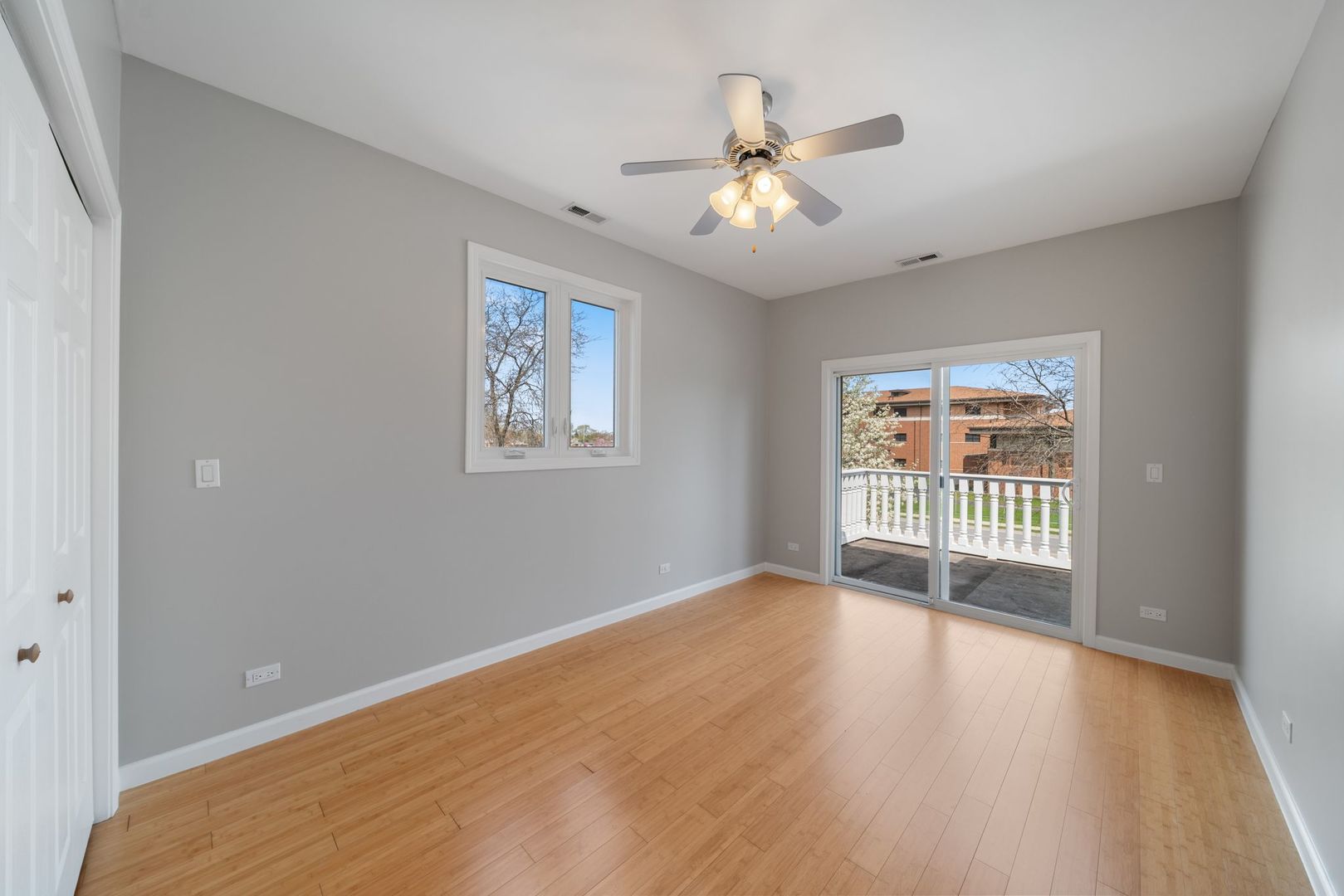701 Oakton Street Park Ridge, IL 60068 - Photo 34 of 59 a view of an empty room with wooden floor and a window