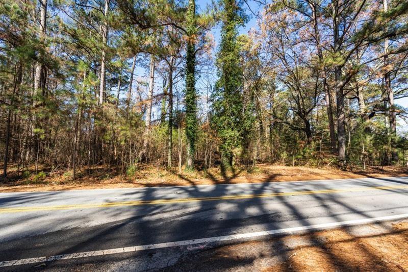 3895 Old Fairburn Road Atlanta, GA 30331 - Photo 13 of 14 a view of a yard with a tree