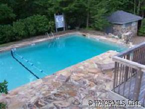 256 Cliff Ridge Drive, Unit 256 Caesars Head, SC 29635 - Photo 8 of 9 a view of a backyard with a patio