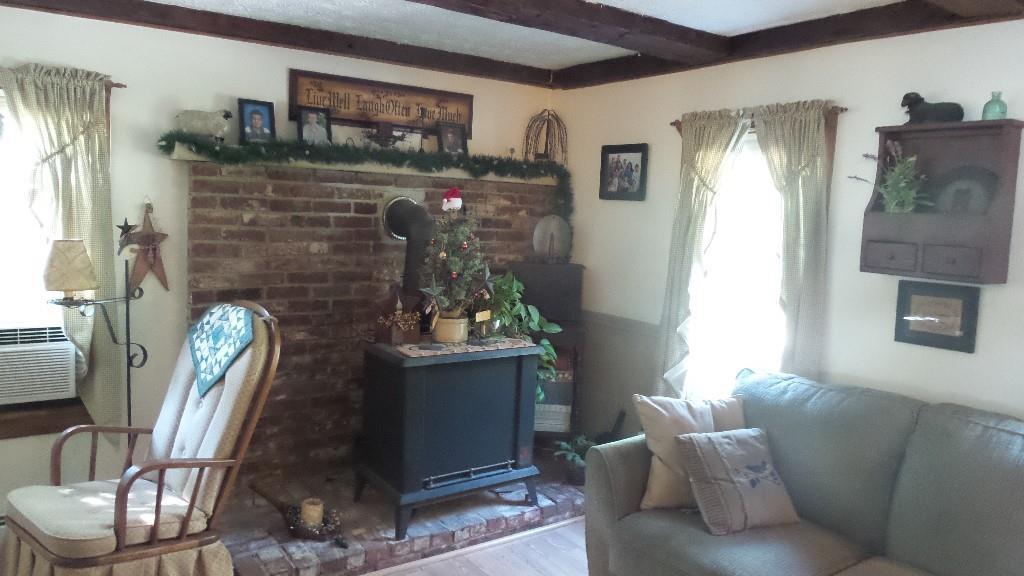 358 Shady Nook Road West Newfield, ME 04095 - Photo 9 of 32 Living room showing wood stove