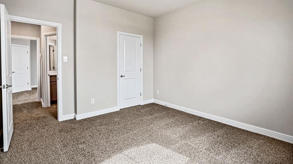 133 Hugo Court Rhome, TX 76078 - Photo 26 of 40 an empty room with closet