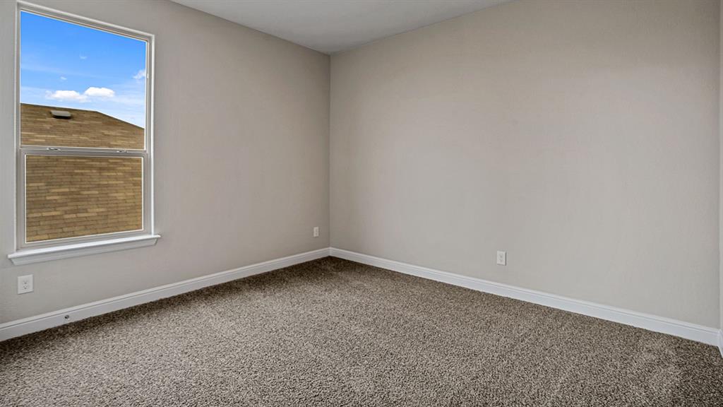 133 Hugo Court Rhome, TX 76078 - Photo 30 of 40 a view of an empty room with a window
