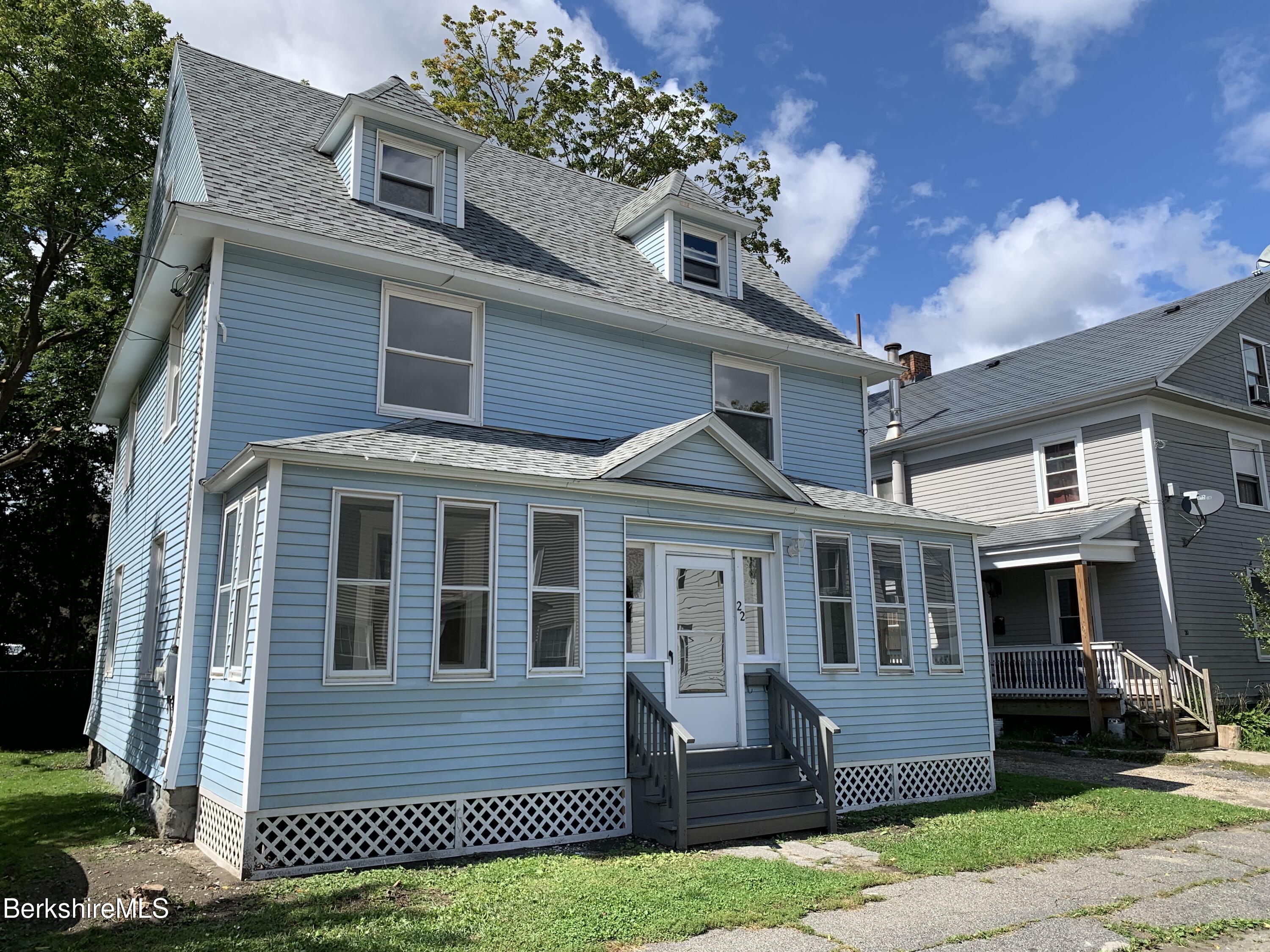 22 Copley Terrace Pittsfield, MA 01201 - Photo 2 of 42 a front view of a house with a yard