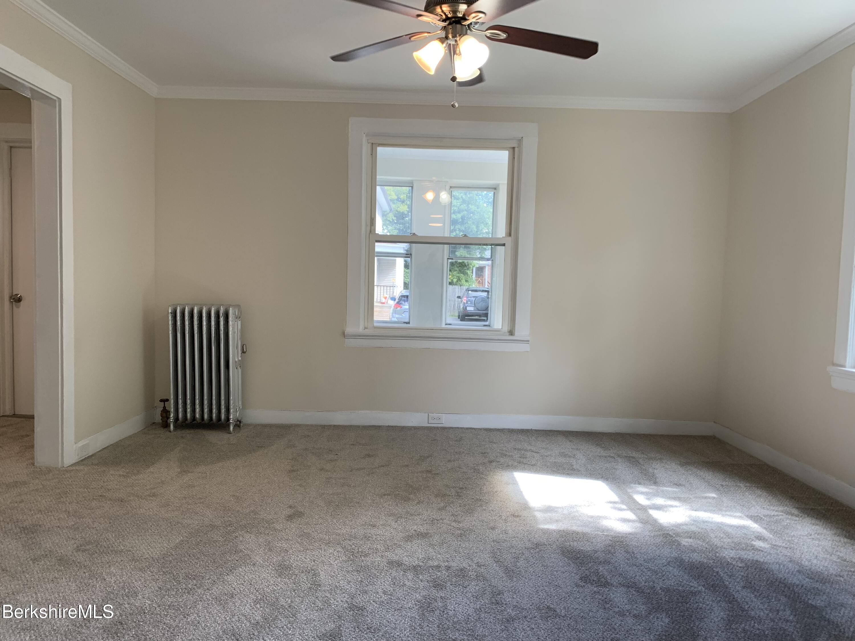 22 Copley Terrace Pittsfield, MA 01201 - Photo 12 of 42 a view of an empty room with a window
