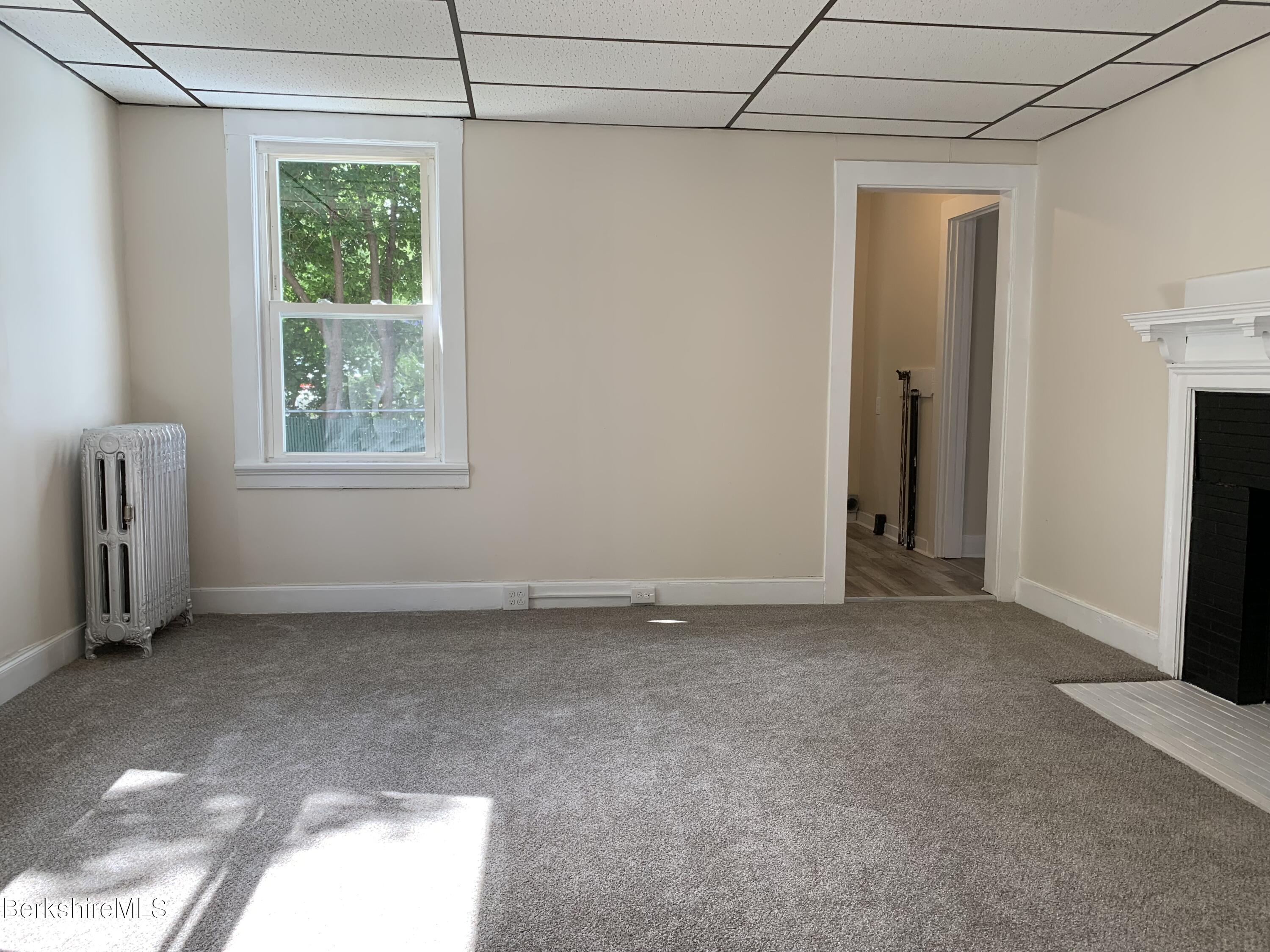 22 Copley Terrace Pittsfield, MA 01201 - Photo 15 of 42 a view of an empty room with a window