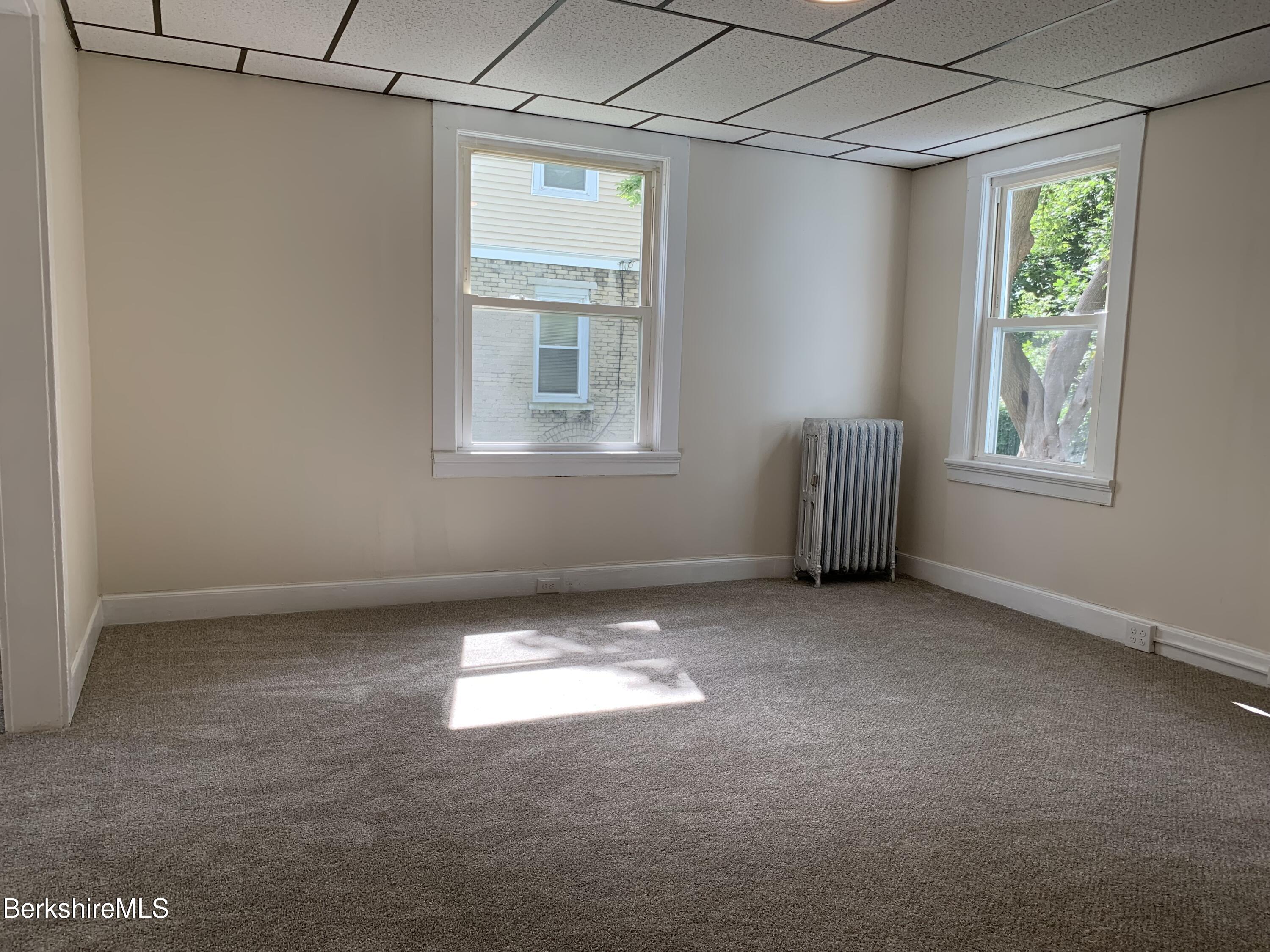 22 Copley Terrace Pittsfield, MA 01201 - Photo 16 of 42 an empty room with windows