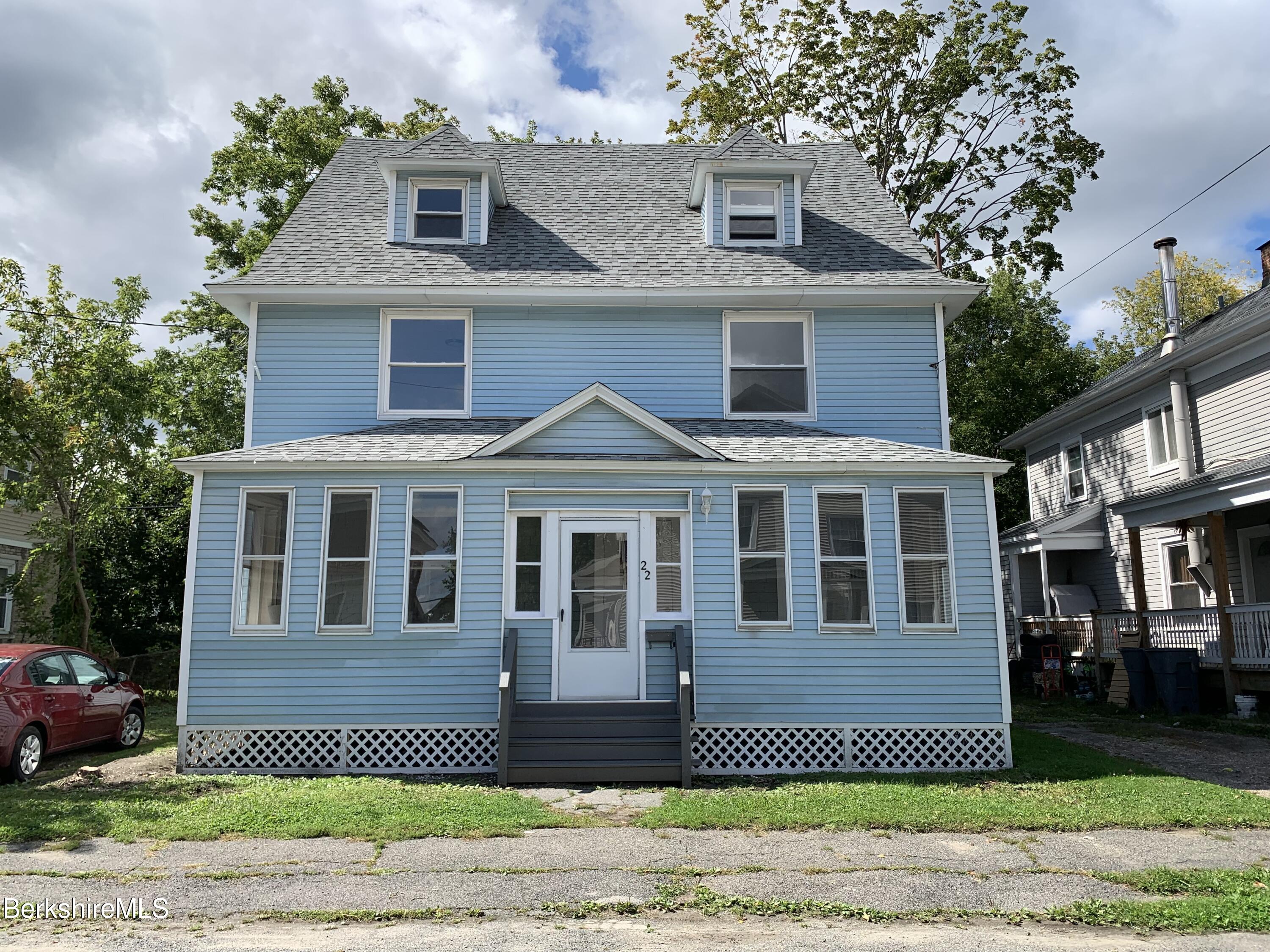 22 Copley Terrace Pittsfield, MA 01201 - Photo 3 of 42 a front view of a house with a garden