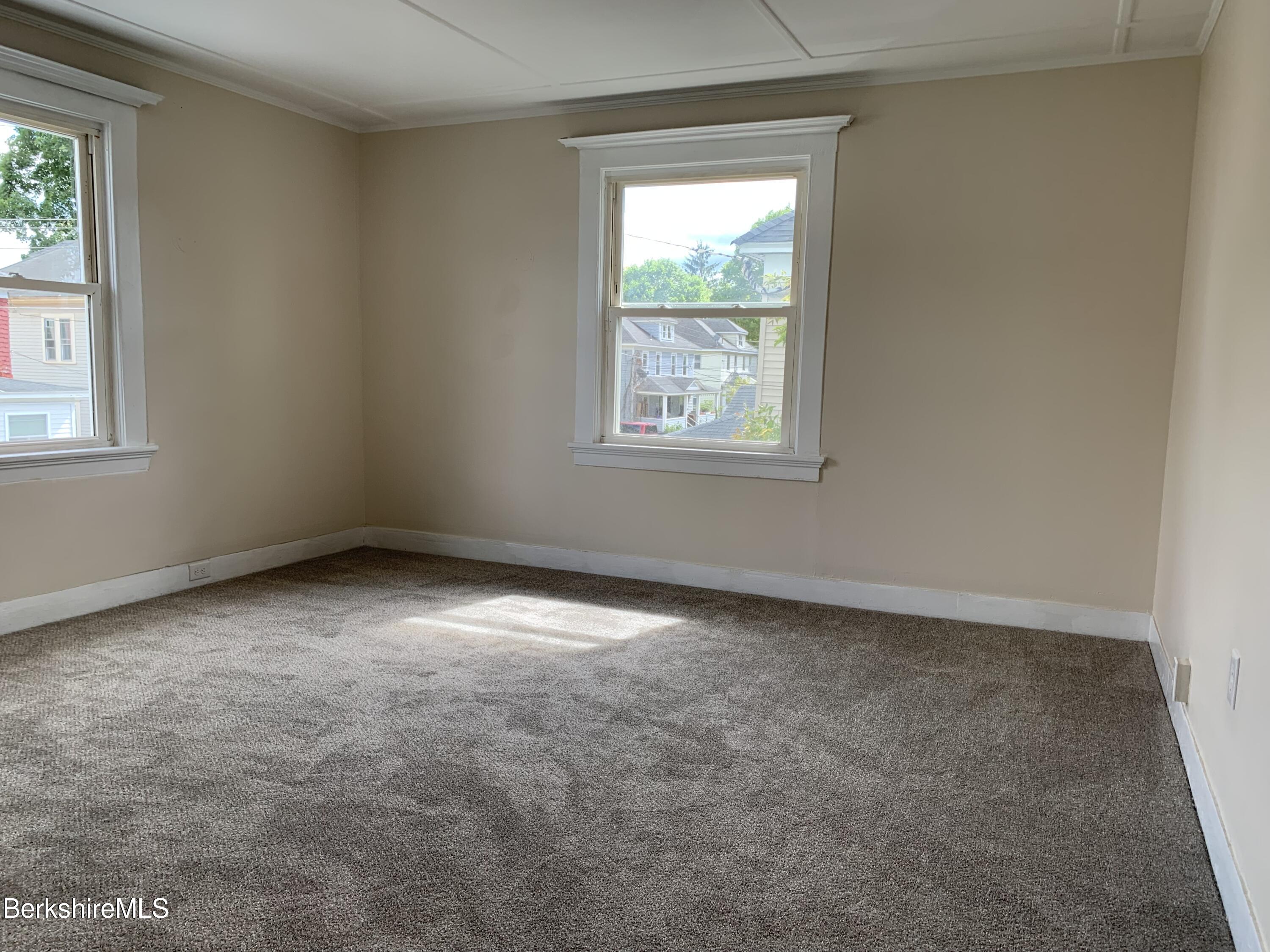 22 Copley Terrace Pittsfield, MA 01201 - Photo 27 of 42 an empty room with windows