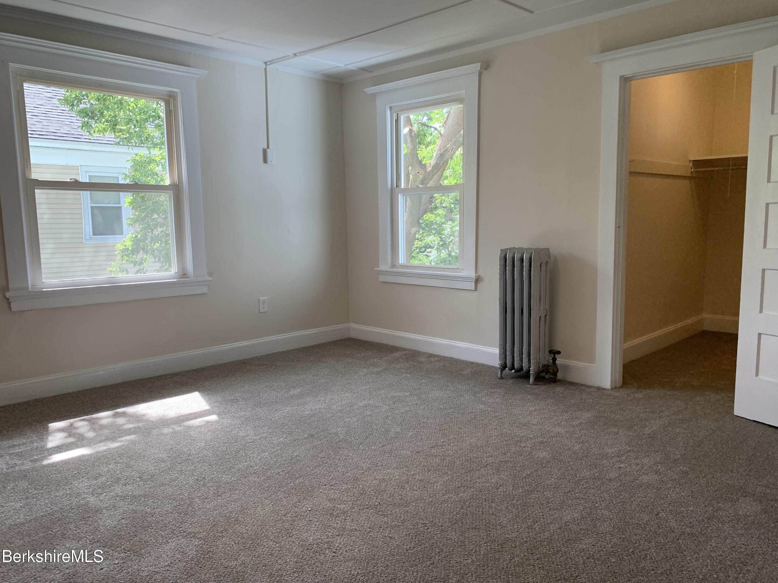 22 Copley Terrace Pittsfield, MA 01201 - Photo 30 of 42 an empty room with windows